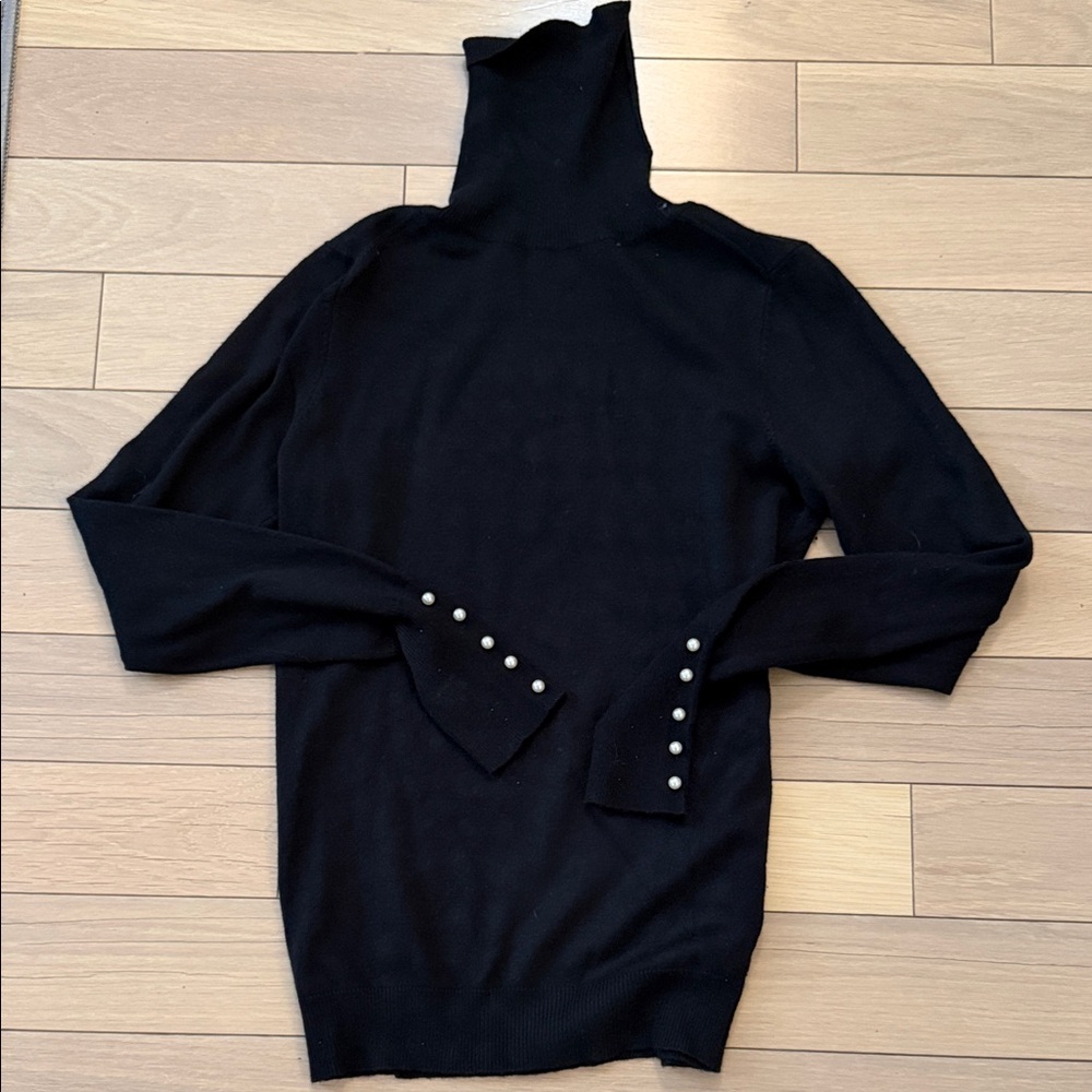 Elegant Black Turtleneck Sweater with Pearl Cuff Buttons